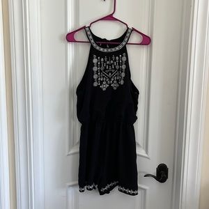 Black romper with white sticking